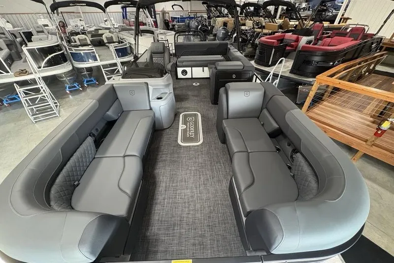 Slide: The Image of 2025 Godfrey Sweetwater 2286 SFL pontoon boat interior with luxurious seating and modern design. - 38