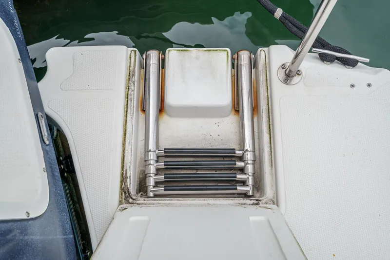 Slide: The Image of Swim platform with ladder on 2014 Cutwater C-30 SC LE boat. - 11