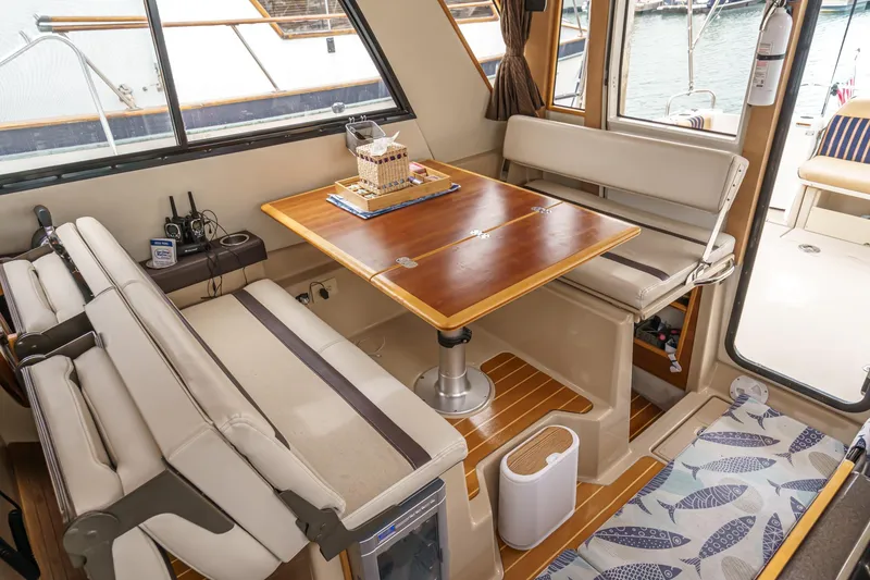 Slide: The Image of Interior of 2014 Cutwater C-30 SC LE boat with dining area and seating. - 31