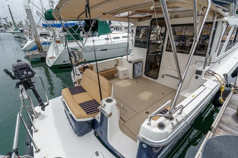 Slide: The Image of 2014 Cutwater C-30 SC LE boat with spacious deck and seating at marina. - 5