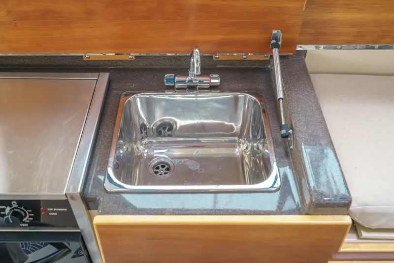Slide: The Image of 2014 Cutwater C-30 SC LE kitchen sink with stainless steel finish and modern faucet. - 42