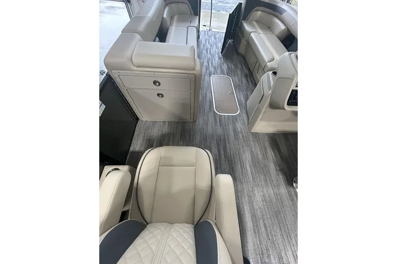 Slide: The Image of Interior of 2025 Godfrey Sweetwater 2286 SB pontoon boat, featuring luxurious seating and modern design. - 6