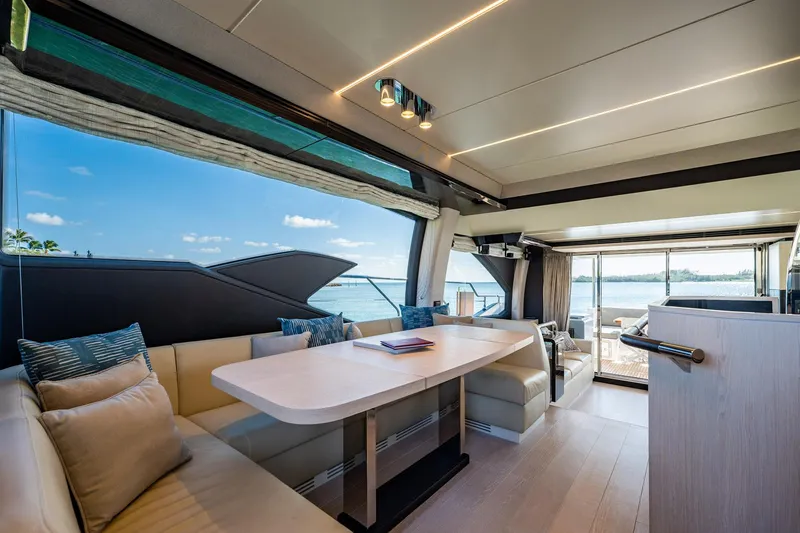 Slide: The Image of Luxurious interior of 2017 Azimut 66 yacht with elegant seating and ocean view. - 11