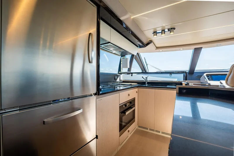 Slide: The Image of Luxurious kitchen interior of 2017 Azimut 66 yacht with modern appliances and sleek design. - 17