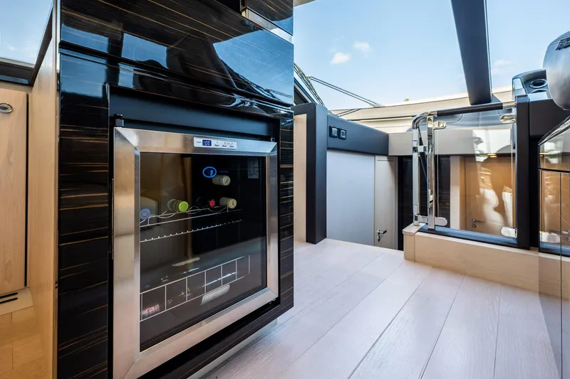 Slide: The Image of Luxurious interior of 2017 Azimut 66 yacht featuring a modern kitchen area. - 20