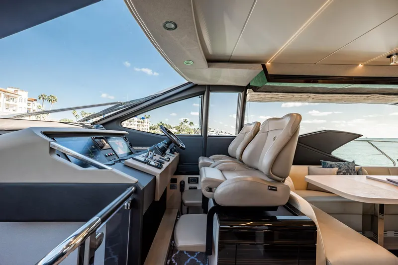 Slide: The Image of Luxurious interior of 2017 Azimut 66 yacht with modern helm and seating. - 23