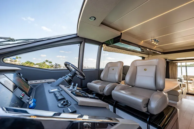 Slide: The Image of Luxurious interior of 2017 Azimut 66 yacht with modern helm and plush seating. - 24