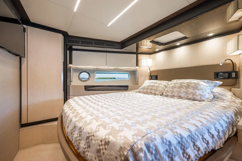 Slide: The Image of Luxurious bedroom interior of 2017 Azimut 66 yacht with modern design and cozy bedding. - 31