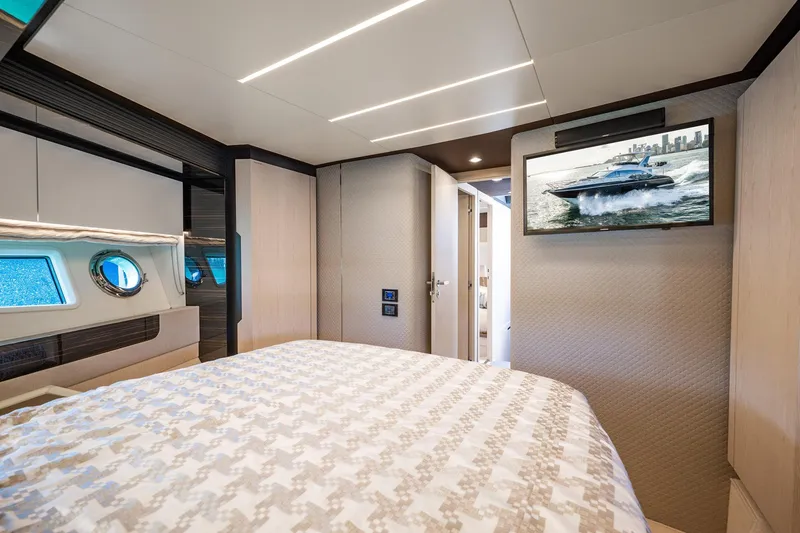 Slide: The Image of Luxurious bedroom interior of 2017 Azimut 66 yacht with modern decor and TV. - 32