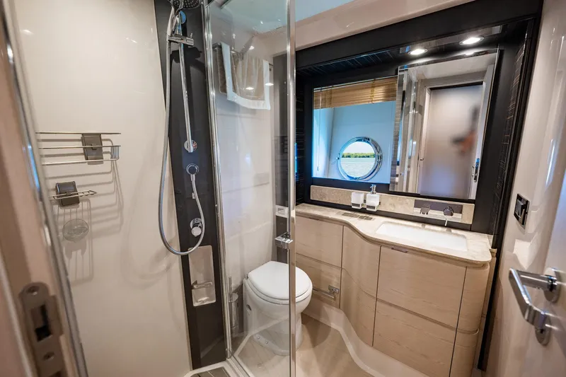 Slide: The Image of Luxurious bathroom in 2017 Azimut 66 yacht with modern shower and elegant fixtures. - 33