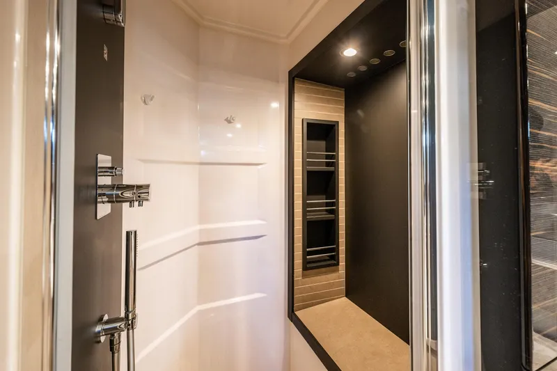Slide: The Image of Luxurious shower area in a 2017 Azimut 66 yacht, featuring modern fixtures and elegant design. - 40