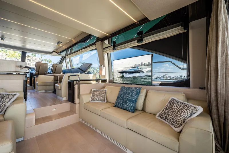 Slide: The Image of Luxurious interior of 2017 Azimut 66 yacht with elegant seating and panoramic windows. - 7