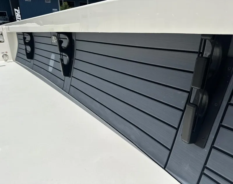 Slide: The Image of 2025 Pathfinder 2500 Hybrid boat with sleek, modern side panel design. - 18