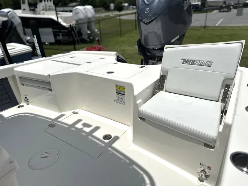 Slide: The Image of 2025 Pathfinder 2500 Hybrid boat interior with seating and storage compartments. - 3