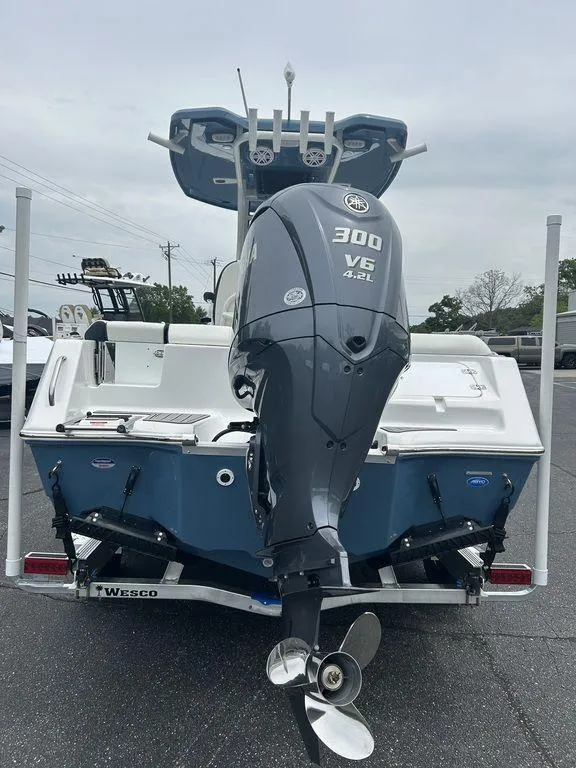 Slide: The Image of 2025 Tidewater 232 LXF boat with powerful 300 V6 engine, rear view. - 4