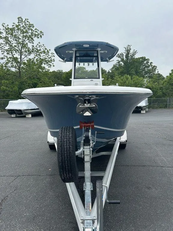 Slide: The Image of 2025 Tidewater 232 LXF boat on trailer, parked outdoors. - 5