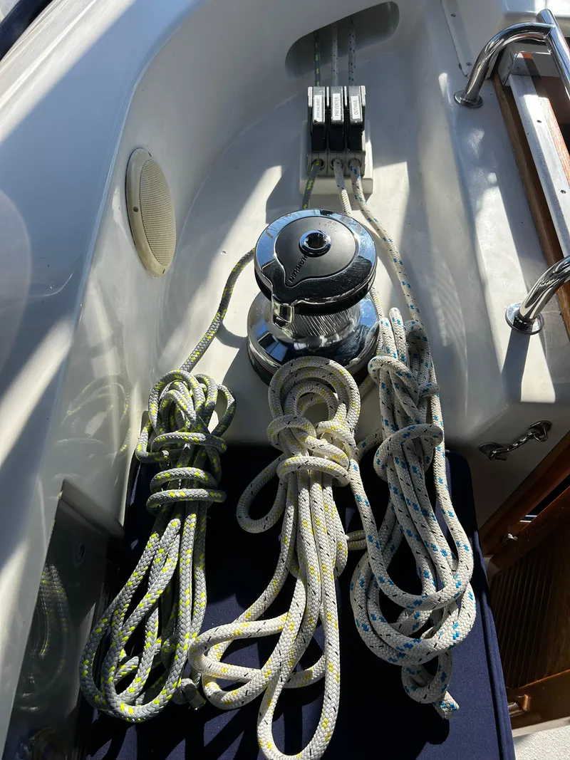 Slide: The Image of Sailboat deck with winch and ropes, Passport 470, 2004 model. - 31
