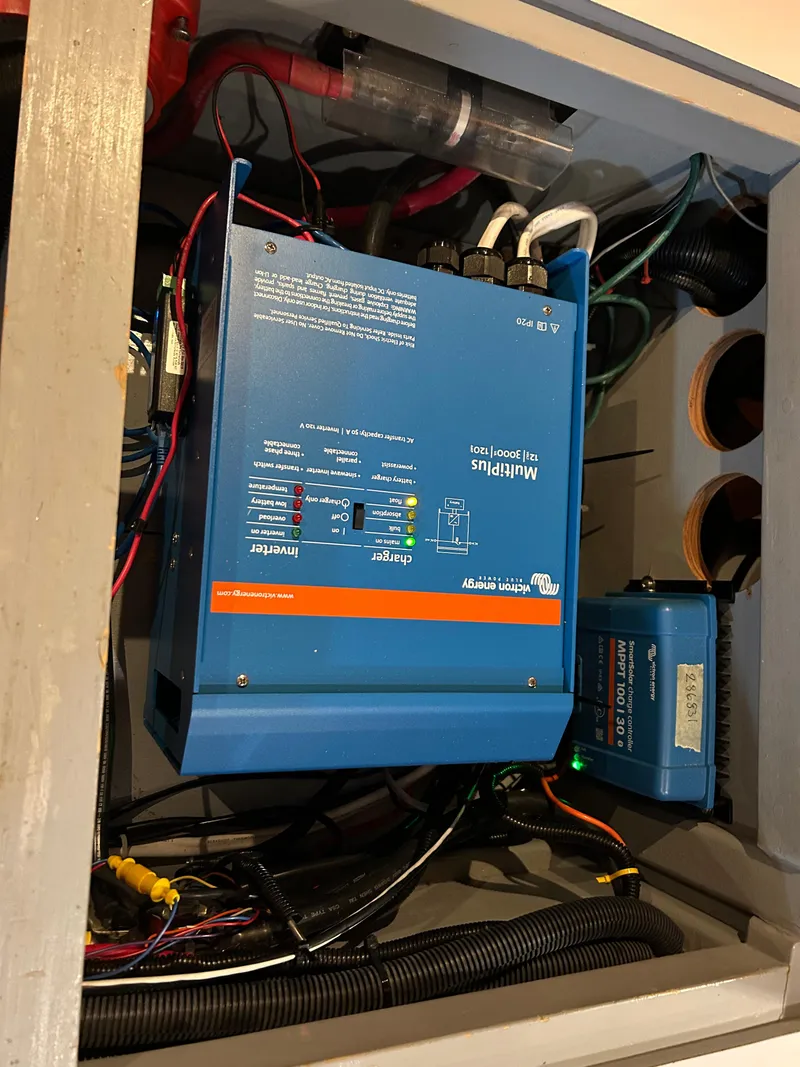 Slide: The Image of Blue electrical equipment setup in a Passport 470, 2004 model. - 36