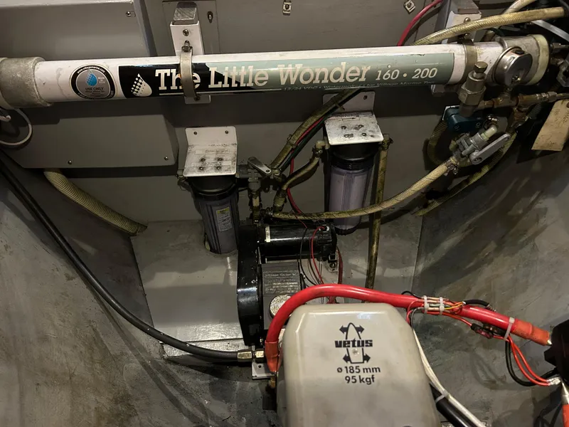 Slide: The Image of Engine room of 2004 Passport 470 yacht featuring "The Little Wonder" watermaker system. - 39