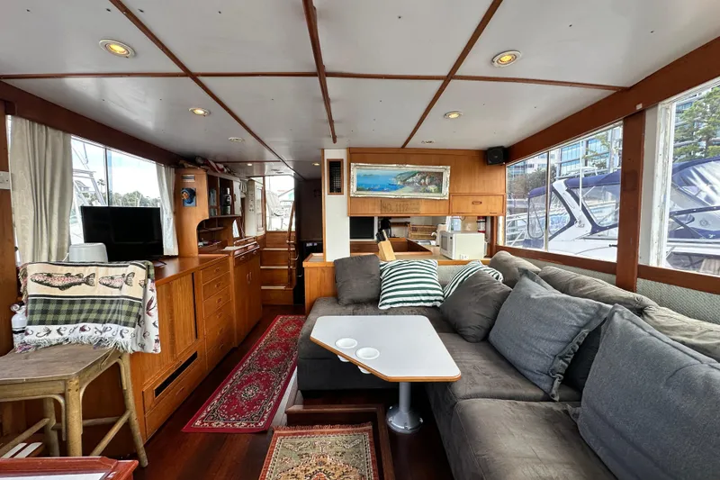 Slide: The Image of Interior of 1980 Island Gypsy Flush Aft Deck Trawler-Motor Yacht with cozy seating and decor. - 39