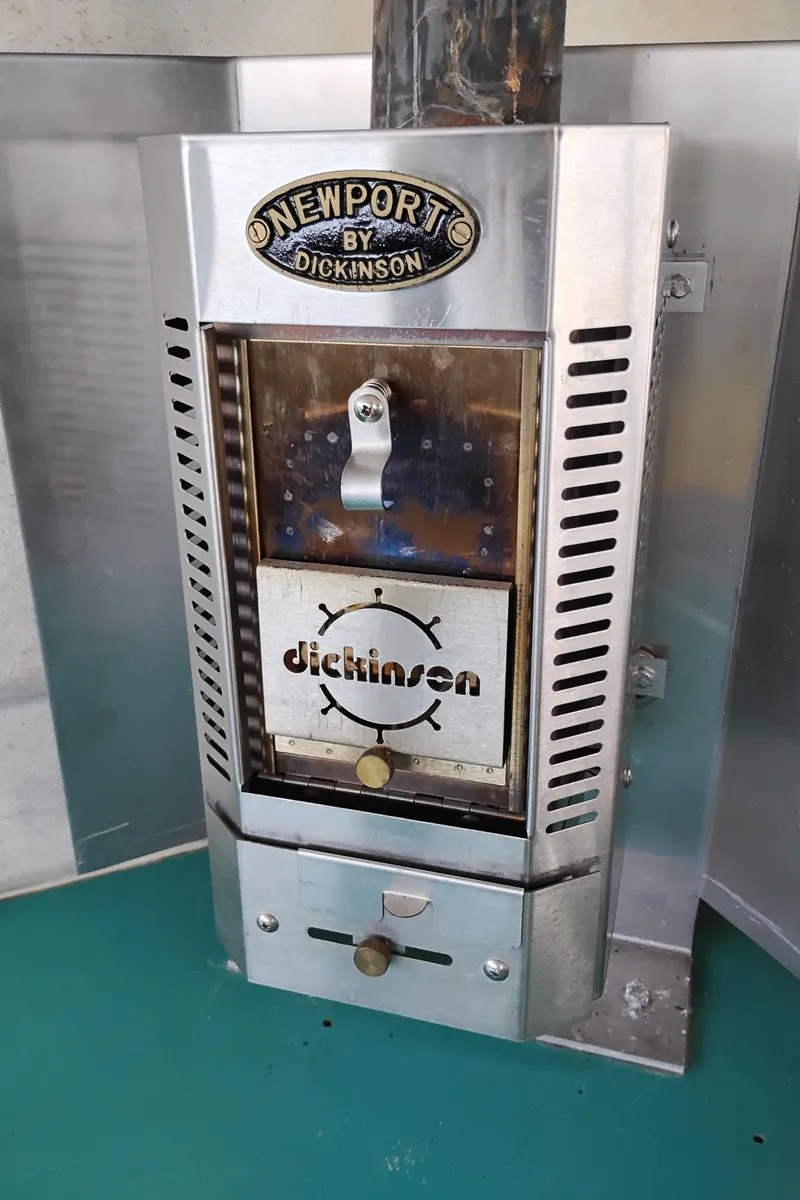 Slide: The Image of Stainless steel Dickinson Newport stove in a 1996 Martin Trunk Cabin. - 18