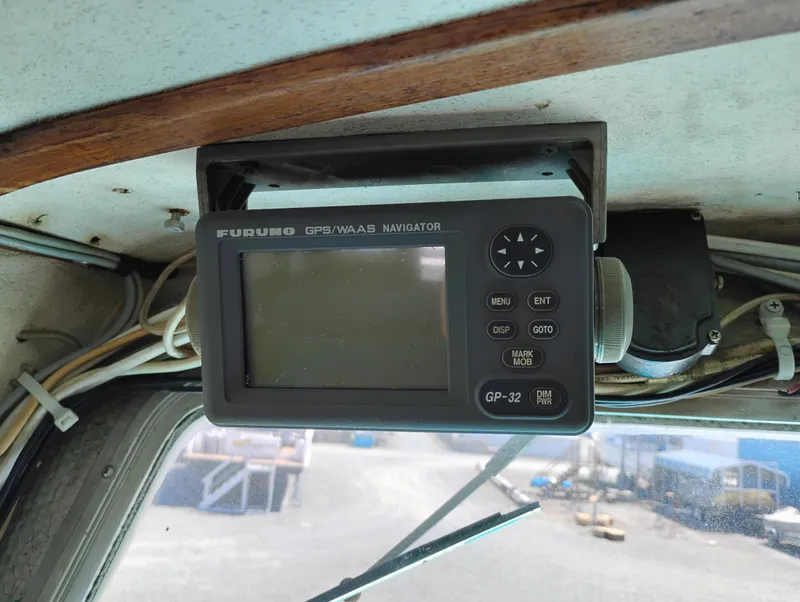 Slide: The Image of Furuno GPS navigator in a 1996 Martin Trunk Cabin boat interior. - 23