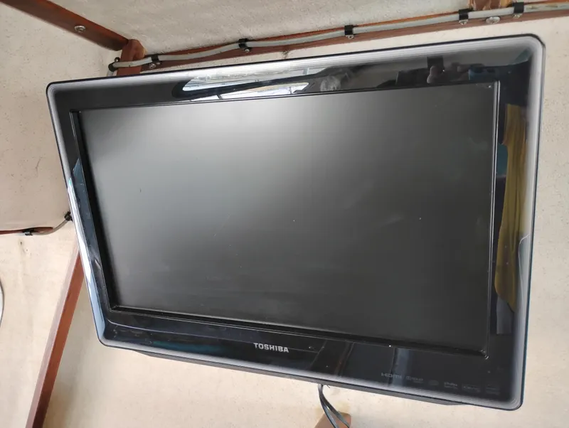 Slide: The Image of Toshiba flat-screen TV mounted inside a 1996 Martin Trunk Cabin. - 31