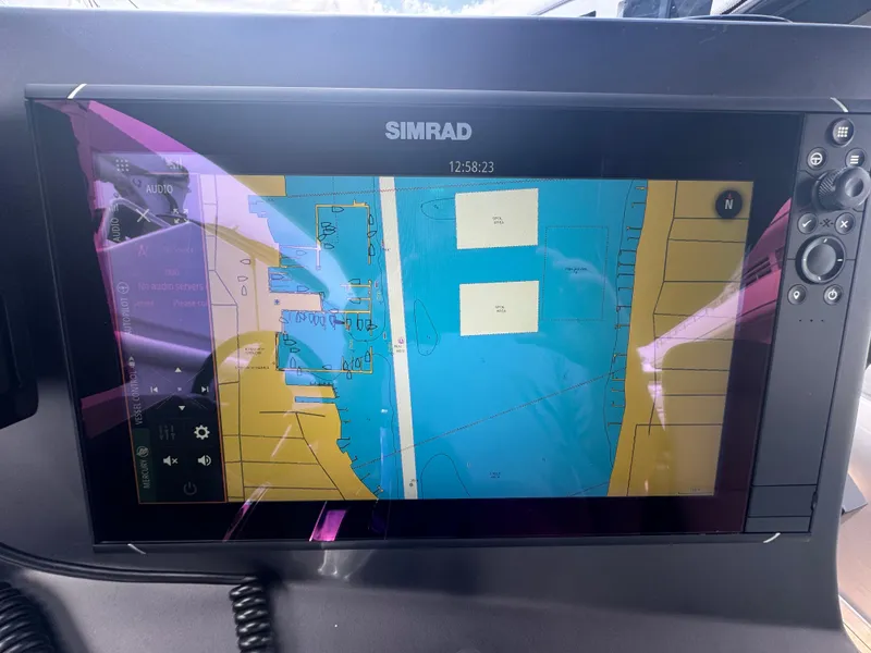 Slide: The Image of Simrad navigation display on 2022 Anvera 42 boat, showing nautical chart. - 9