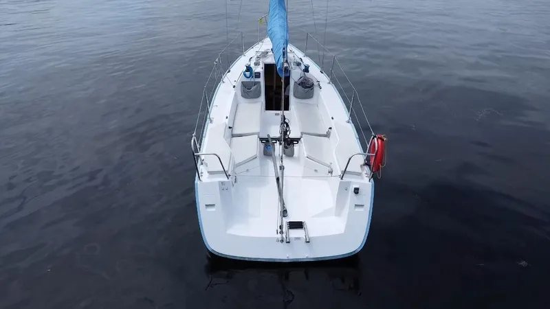 Slide: The Image of 2015 Catalina 275 Sport sailboat on calm water, aerial view. - 11