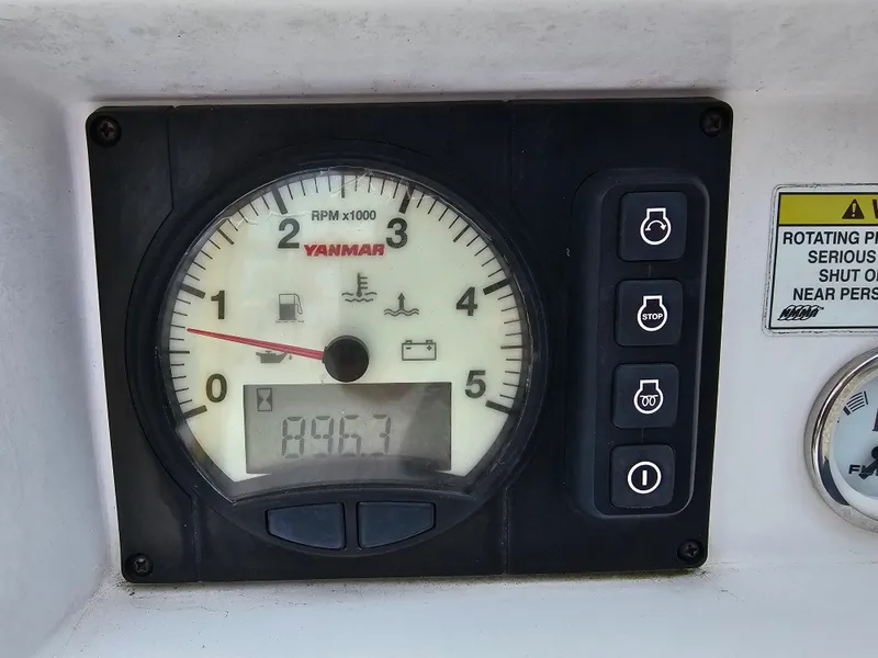 Slide: The Image of Close-up of a Yanmar tachometer on a 2015 Catalina 275 Sport boat. - 14