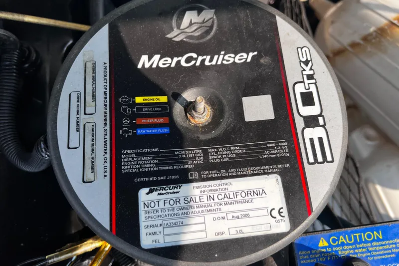 Slide: The Image of MerCruiser 3.0L engine label on 2009 Glastron GT 185, not for sale in California. - 10