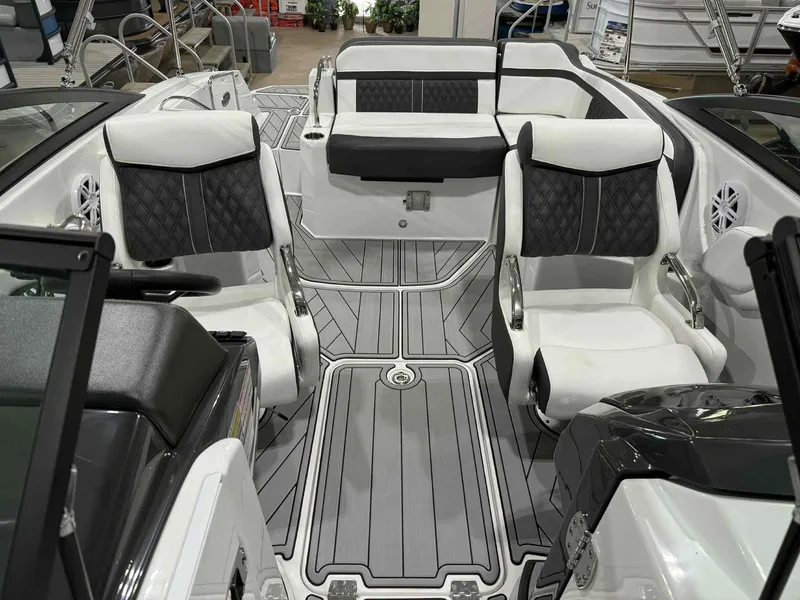 Slide: The Image of 2025 Monterey M4 boat interior with modern seating and sleek design. - 11