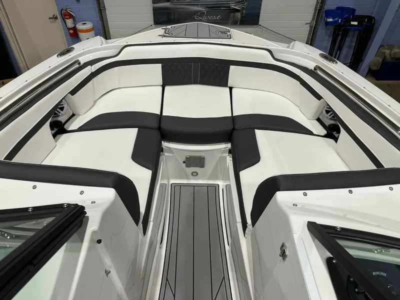 Slide: The Image of 2025 Monterey M4 boat interior with sleek black and white seating design. - 12