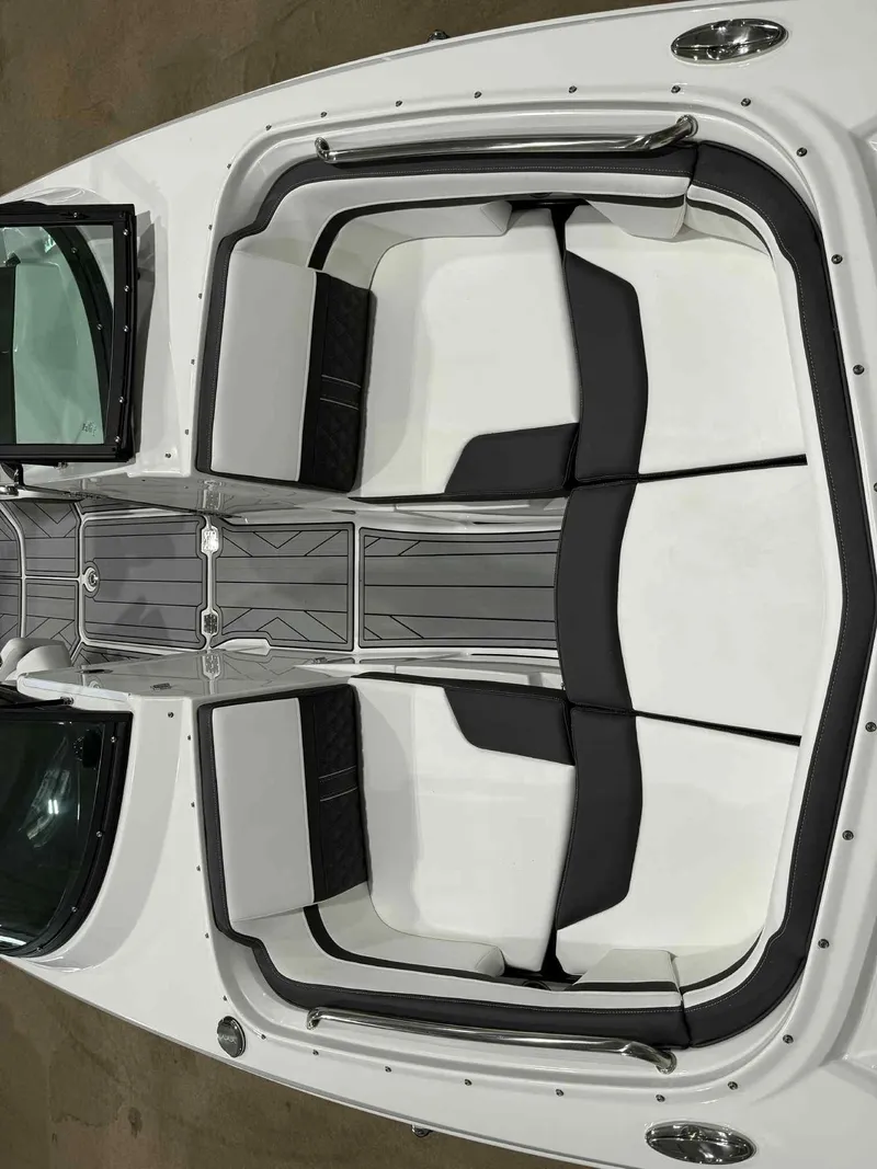 Slide: The Image of 2025 Monterey M4 boat interior with sleek seating and modern design. - 13