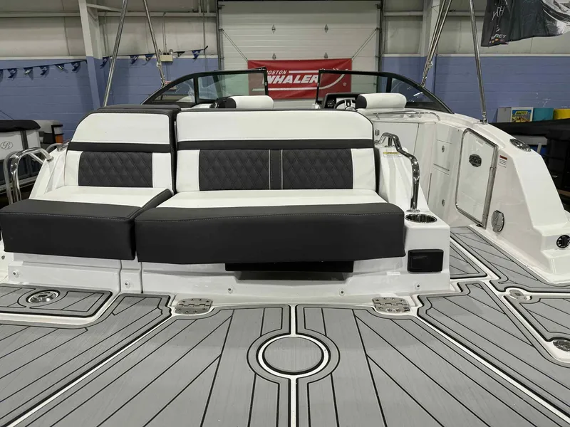 Slide: The Image of 2025 Monterey M4 boat interior with sleek seating and modern design. - 5