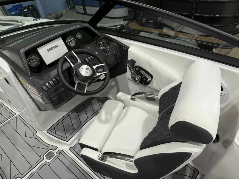 Slide: The Image of 2025 Monterey M4 boat interior with modern dashboard and steering wheel design. - 9