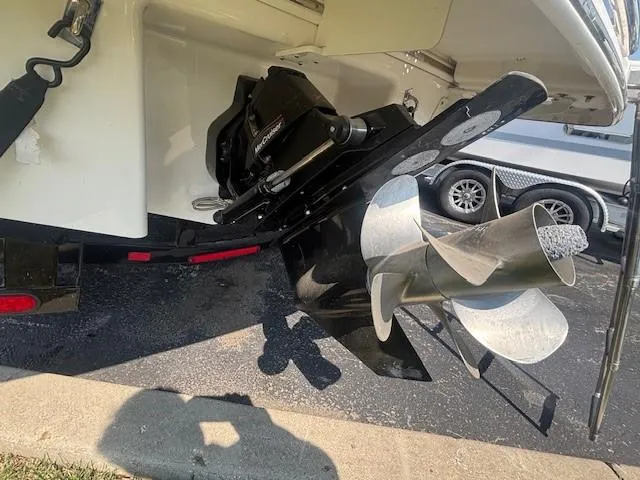 Slide: The Image of 2020 Chaparral 257 SSX boat interior with white seating and sleek design. - 15