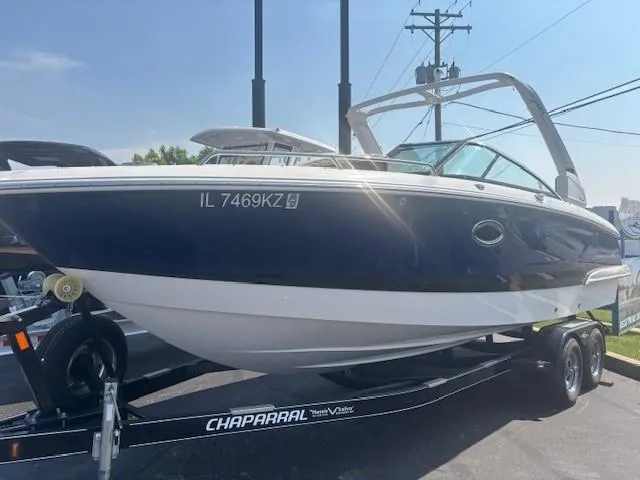Slide: The Image of 2020 Chaparral 257 SSX boat rear view with swim platform and ladder. - 19