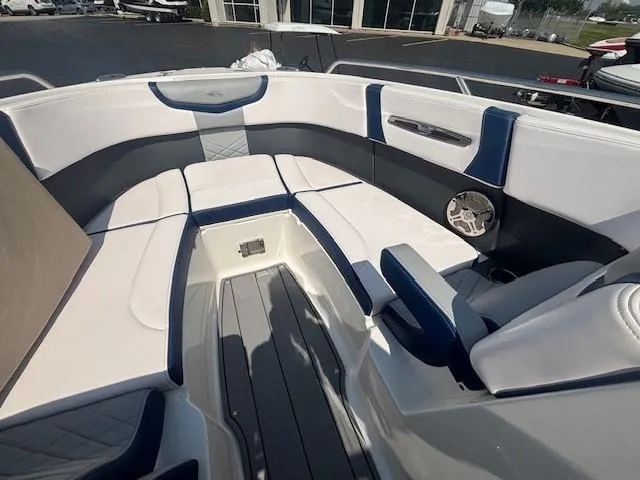 Slide: The Image of 2020 Chaparral 257 SSX boat on trailer, parked outdoors. - 4