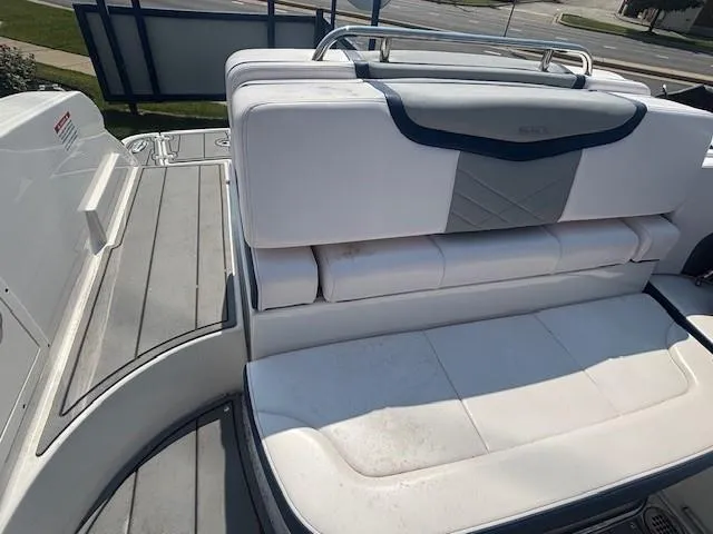 Slide: The Image of 2020 Chaparral 257 SSX boat interior with steering wheel and seating area. - 8