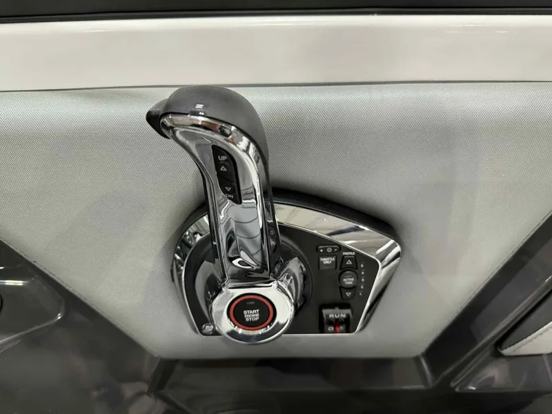 Slide: The Image of 2025 Monterey 218 SS boat throttle control with start button, chrome finish. - 14