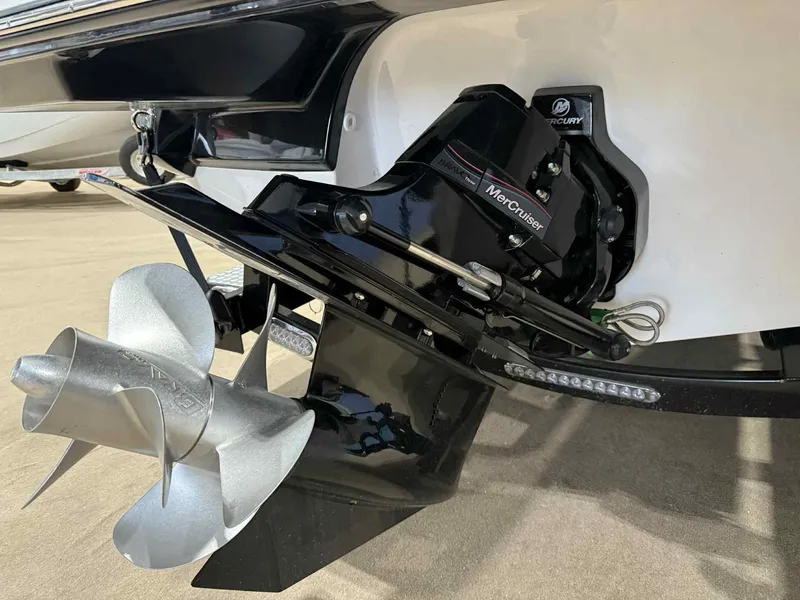 Slide: The Image of 2025 Monterey 218 SS boat with MerCruiser engine and propeller detail. - 20