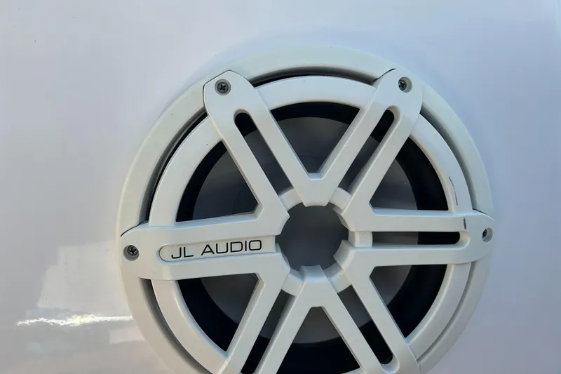 Slide: The Image of White JL Audio speaker on a 2018 Sportsman 282 boat. - 4