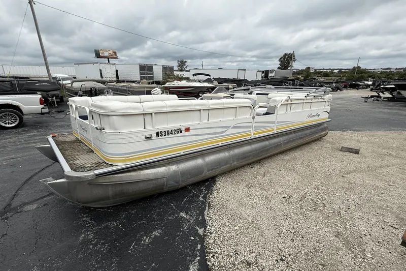 The Image of 2005 Bentley Pontoons 240 CRUISE pontoon boat in a parking lot. - 0