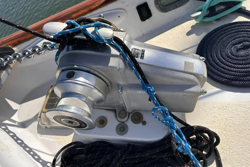 Slide: The Image of Anchor winch on 1986 Irwin 43 Mk II Cruiser with ropes and chains. - 24