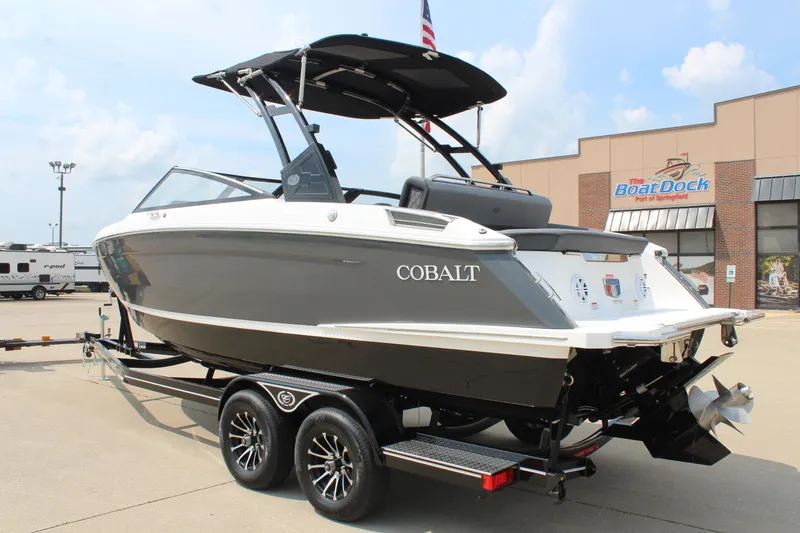 Slide: The Image of Free ICON golf cart offer with 2026 Cobalt R4 boat at Colman's RV. - 1