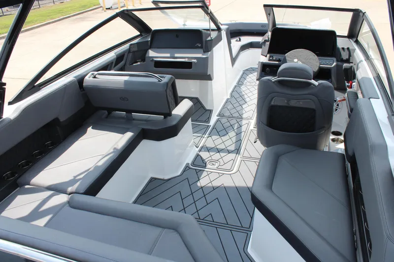 Slide: The Image of 2026 Cobalt R4 boat interior with sleek seating and modern dashboard design. - 11