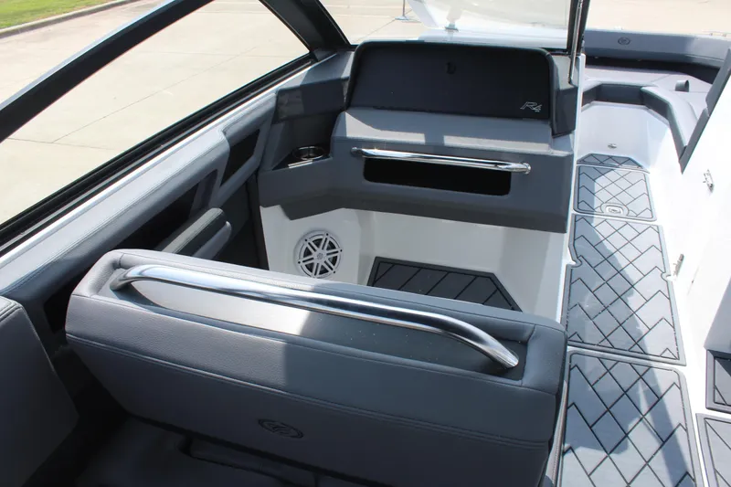 Slide: The Image of 2026 Cobalt R4 boat interior with sleek seating and modern design elements. - 18