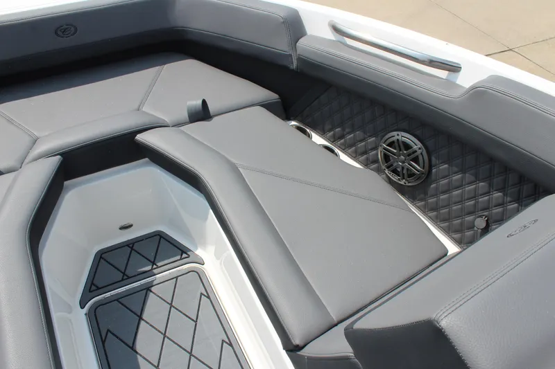 Slide: The Image of Luxurious interior of 2026 Cobalt R4 boat with sleek seating and speaker system. - 27