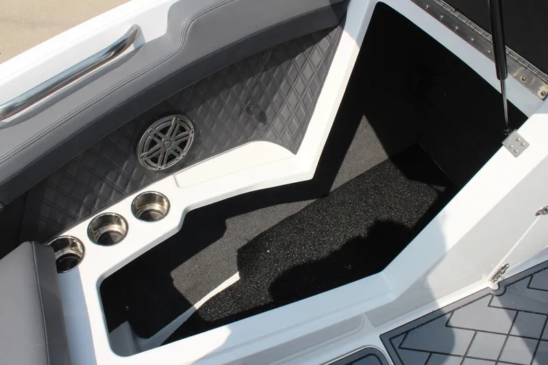 Slide: The Image of Interior of 2026 Cobalt R4 boat with cup holders and speaker. - 31